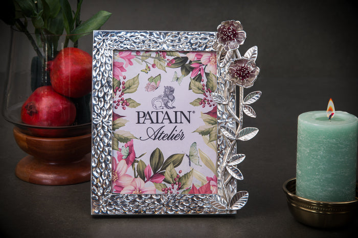 A ROSE IN ARGENT FRAME