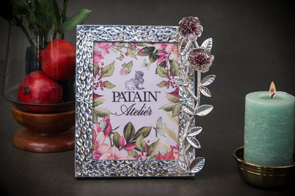 A ROSE IN ARGENT FRAME