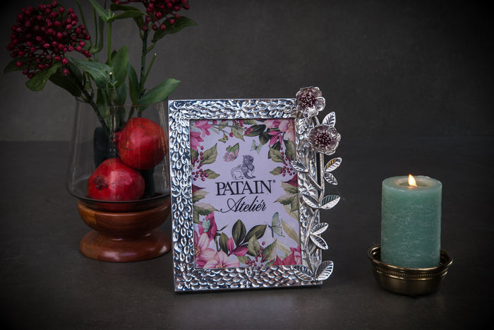 A ROSE IN ARGENT FRAME